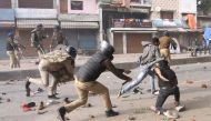 Police clash with protesters during demonstrations against India's new citizenship law in Lucknow on December 19, 2019. (AFP)