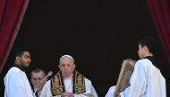 Pope Francis celebrates from the balcony of St Peter's basilica during the traditional 