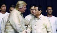 Donald Trump shakes hands with Rodrigo Duterte during the gala dinner marking ASEAN 50th anniversary in Manila, November 12, 2017. Reuters / Athit Perawongmetha