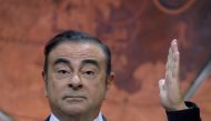 Carlos Ghosn gestures as he addresses a press conference in Paris on September 15, 2017 to present the Renault Nissan group strategy. AFP / Eric Piermont