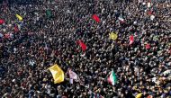 Iranian mourners gather during the final stage of funeral processions for slain top general Qasem Soleimani, in his hometown Kerman on January 7, 2020. AFP / ATTA KENARE