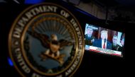 US President Donald Trump is seen on a television screen as he delivers a statement about Iran, seen in the Pentagon briefing room in Arlington, Virginia, US, January 8, 2020. Reuters/Al Drago
 