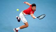  Novak Djokovic of Serbia hits a return in his men's singles match against Denis Shapovalov of Canada at the ATP Cup tennis tournament in Sydney on January 10, 2020. -- I
/ AFP / William WEST /