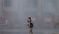 Thailand authorities wash the dust off streets in the capital city after the particulate matter reached hazardous levels in Bangkok, January 14, 2019. Reuters / Soe Zeya Tun