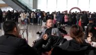 Travellers wait for their trains inside Zhengzhou East Railway Station during the annual Spring Festival travel rush ahead of the Chinese Lunar New Year, in Zhengzhou, Henan province, China January 13, 2020. Picture taken January 13, 2020. REUTERS/Jason L