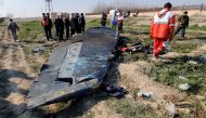 FILE PHOTO: General view of the debris of the Ukraine International Airlines, flight PS752, Boeing 737-800 plane that crashed after take-off from Iran's Imam Khomeini airport, on the outskirts of Tehran, Iran January 8, 2020 is seen in this screen grab ob