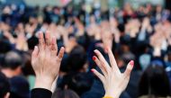 Anti-government protesters rise their hands as they attend a rally to call for democratic reforms in Hong Kong, China January 19, 2020. Reuters/Tyrone Siu
 
