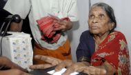 A villager goes through the process of a fingerprint scanner during Unique Identification database system in the Pathancheru village in Medak district of Andhra Pradesh, April 27, 2010. Reuters / Krishnendu Halder