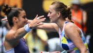 Greece's Maria Sakkari (L) congratulates Czech Republic's Petra Kvitova on her win in their women's singles match on day seven of the Australian Open tennis tournament in Melbourne on January 26, 2020.  AFP / William West 