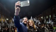 Leader of Italy's far-right League party Matteo Salvini takes a selfie with Lucia Borgonzoni, rightwing coalition candidate for President of Emilia-Romagna, during a rally ahead of a regional election in Emilia-Romagna, in Ravenna, Italy, January 24, 2020