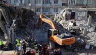 Search and rescue personnel work at the site of a collapsed building, after an earthquake in Elazig, Turkey, January 27, 2020. REUTERS/Umit Bektas