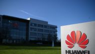 A photograph shows the logo of Chinese company Huawei at their main UK offices in Reading, west of London, on January 28, 2020. AFP / DANIEL LEAL-OLIVAS