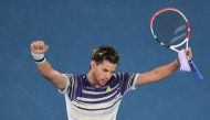 Austria's Dominic Thiem celebrates after victory against Spain's Rafael Nadal during their men's singles quarter-final match on day ten of the Australian Open tennis tournament in Melbourne on January 29, 2020. AFP / Manan Vatsyayana 