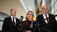 German Economy Minister Peter Altmaier (R), Finance Minister and Vice-Chancellor Olaf Scholz and Environment Minister Svenja Schulze give a press conference about the exit from coal power in Berlin on January 29, 2020. AFP / Tobias SCHWARZ