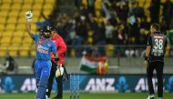 India's captain Virat Kohli (L) with teammate Sanju Samson (R) celebrate their win during the fourth Twenty20 international cricket match between New Zealand and India at Sky Stadium in Wellington on January 31, 2020. (AFP / Marty MELVILLE)