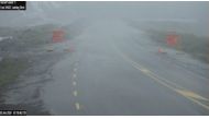A closed road is seen in flood-affected Southland, New Zealand, February 3, 2020, in this image obtained via social media. New Zealand Transport Agency via REUTERS