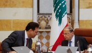 Lebanon's Prime Minister Hassan Diab speaks with Lebanon's President Michel Aoun during a cabinet meeting at the presidential palace in Baabda, Lebanon February 6, 2020. REUTERS/Mohamed Azakir