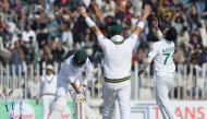 Pakistan's bowler Naseem Shah (R) celebrates after taking the wicket of Bangladesh's Saif Hassan (L) during the third day of the first cricket Test match between Pakistan and Bangladesh at the Rawalpindi Cricket Stadium in Rawalpindi on February 9, 2020. 