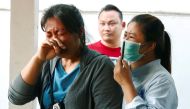 Victim's family members cry at a hospital following a gun battle involving a Thai soldier on a shooting rampage, in Nakhon Ratchasima, Thailand, February 9, 2020. Reuters/Athit Perawongmetha
 