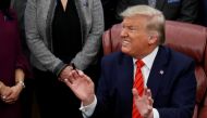 U.S. President Donald Trump reacts to a question from a reporter following a signing ceremony for the Supporting Veterans in STEM Careers Act inside the Oval Office of the White House in Washington, U.S., February 11, 2020. REUTERS/Tom Brenner