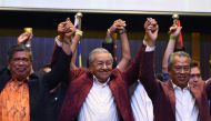  Former Malaysian prime minister and opposition candidate Mahathir Mohamad celebrates with other leaders of his coalition on May 10, 2018.(AFP / Manan VATSYAYANA)