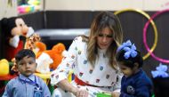 US first lady Melania Trump plays with children at the Sarvodaya Co-Education Senior Secondary School in Moti Bagh, in New Delhi, during a visit by U.S. President Donald Trump in India, February 25, 2020. Reuters/Anushree Fadnavis