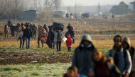 Migrants walk towards Turkey's Pazarkule border crossing with Greece's Kastanies, near Edirne, Turkey March 1, 2020. REUTERS/Huseyin Aldemir