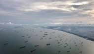 FILE PHOTO: A bird's-eye view of ships along the coast in Singapore July 9, 2017. REUTERS/Jorge Silva/File Photo