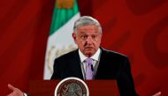 FILE PHOTO: Mexico's President Andres Manuel Lopez Obrador gestures as he speaks during a news conference at the National Palace in Mexico City, Mexico February 18, 2020. REUTERS/Henry Romero/File Photo