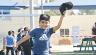 A child taking part in a sport competition during Compass International School sports week.