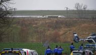 Gendarmes arrive near the site where a high-speed TGV train locomotive derailed close to Inhenheim early on March 5, 2020 while travelling from the eastern city of Strasbourg to Paris./ AFP / Patrick HERTZOG
