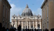  People walk on St. Peter's Square after the Vatican reports its first case of coronavirus, at the Vatican, March 6, 2020. REUTERS/Yara Nardi 