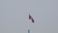 North Korean flag flutters on top of the 160-metre tall tower at North Korea's propaganda village of Gijungdong, in this picture taken from Tae Sung freedom village near the Military Demarcation Line (MDL), inside the demilitarised zone separating the two