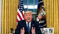 US President Donald Trump addresses the Nation from the Oval Office about the widening novel coronavirus (Covid-19) crisis in Washington, DC on March 11, 2020. / AFP / POOL / Doug Mills
