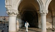 A worker sanitises the Doges Palace on St. Mark's square as a measure to fight against the coronavirus contagion in Venice, Italy, March 12, 2020. REUTERS/Manuel Silvestri