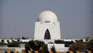Pakistan's national flag flatters at the deserted mausoleum of Muhammad Ali Jinnah, who regarded as father of nation, after Pakistan shut all its schools and discouraged large gatherings amid coronavirus disease outbreak (COVID-19), in Karachi, Pakistan M