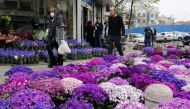 Iranians, some wearing protective face masks, shop for traditional items ahead of Nowruz, the national New Year 2-week celebration, at the Tajrish Bazaar in the capital Tehran on March 19, 2020, despite the heavy death toll due to infections by the novel 