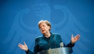 German Chancellor Angela Merkel makes a press statement on the spread of the new coronavirus COVID-19 at the Chancellery in Berlin. / AFP / POOL / Michael Kappeler