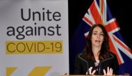 New Zealand's Prime Minister Jacinda Ardern speaks to the media during a press conference one day before the country goes on lockdown to stop any progress of the COVID-19 coronavirus, at Parliament in Wellington on March 24, 2020. / AFP / Marty MELVILLE