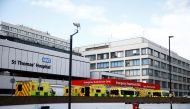Ambulances are seen outside St Thomas' hospital, as the spread of the coronavirus disease (COVID-19) continues, London, Britain, March 29, 2020. REUTERS/Henry Nicholls