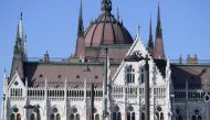 Picture taken on April 2, 2020 shows the parliament building on the banks of Danube River in Budapest, Hungary. AFP / ATTILA KISBENEDEK