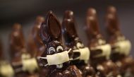 Chocolate Easter bunnies wearing protective masks are seen in the workshop of Belgian artisan chocolate maker Genevieve Trepant, during the coronavirus disease (COVID-19) outbreak in Lonzee, Belgium April 10, 2020. REUTERS/Yves Herman