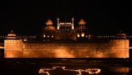 :NEW DELHI, INDIA - APRIL 18: Archaeological Survey of India (ASI) lights earthen lamps in the form of Indian map and illuminates the Red fort on the occasion of World Heritage Day and in solidarity with health workers during the nationwide lockdown, at a