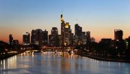 :The skyline with its financial district is photographed during sunset in Frankfurt, Germany, April 22, 2020, as the spread of the coronavirus disease (COVID-19) continues. REUTERS/Kai Pfaffenbach