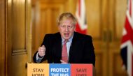 (FILES) In this file photo taken on March 25, 2020 A handout image released by 10 Downing Street, shows Britain's Prime Minister Boris Johnson speaking during a remote press conference to update the nation on the Covid-19 pandemic, in side 10 Downing Stre