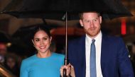 (FILES) In this file photo taken on March 05, 2020 Britain's Prince Harry, Duke of Sussex (R) and Meghan, Duchess of Sussex arrive to attend the Endeavour Fund Awards at Mansion House in London. / AFP / DANIEL LEAL-OLIVAS