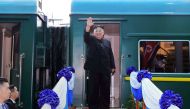 (FILES) This file photo taken on March 2, 2019 shows North Korea's leader Kim Jong Un waving before boarding his train at the Dong Dang railway station in the Vietnamese town of Lang Son./ AFP / Vietnam News Agency / STR