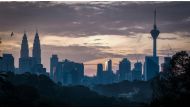 KUALA LUMPUR, MALAYSIA - APRIL 22: A view of Kuala Lumpur City at dawn on Earth Day 2020 taken from the top of Kenny Hills in Kuala Lumpur, Malaysia, on April 22, 2020. ( Syaiful Redzuan - Anadolu Agency )
