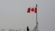 (FILES) This file photograph taken on March 13, 2015, shows a Canadian soldier as he stands on board frigate HMCS Fredericton docked at Constanta Harbour in Constanta, Romania.   / AFP / Daniel MIHAILESCU