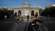 MADRID, SPAIN - MAY 2: People ride bicycles as the government allowed people to exercise within 1 km around of their house starting today in Madrid, Spain on May 2, 2020. The death toll from coronavirus (Covid-19) outbreak has reached 25,100 so far, incre